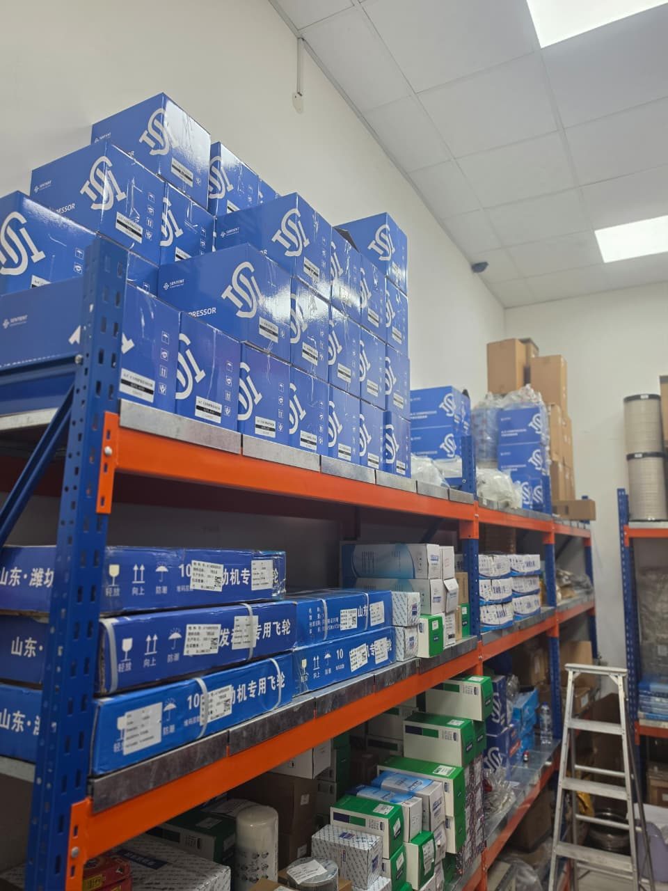 Stocked shelves of crane spare parts